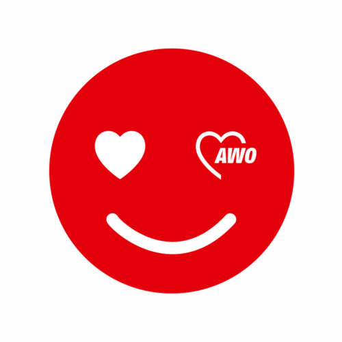 runder roter Aufkleber AWO-Smiley, ein Auge ein Herz, ein Auge ein AWO-Logo