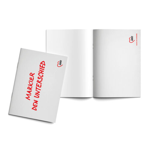 Notizblock mit AWO-Logo und Aufschrift „Markier den Unterschied“